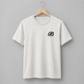 A vintage white short-sleeve crewneck t-shirt hanging on a wooden hanger. The shirt features a black small 'UB' logo on the left chest with 'Ummah Balance' printed underneath.